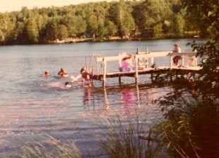 The cousins swimming at the cottage.